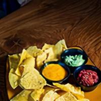 Southwestern Trio Dip · Homemade salsa, guacamole and house-made 2 Silos beer cheese. Served with tortilla chips.