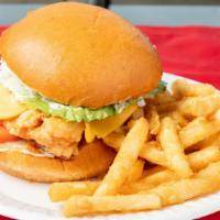 Chicken Burger · Lettuce, Tomatoes, Caramelized Onions and Mayo with American Cheese.