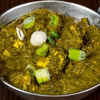 Saag Paneer · Fresh spinach cooked with green mustard, homemade paneer, sauteed with garlic, ginger & spices