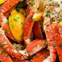 1 Lb. Snow Crab Legs(2 Claws) · served with potatoes and corn then blended with one of our signature seasoning you choose.