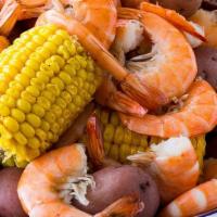 1 Lb. Headless Shrimp · served with potatoes and corn then blended with one of our signature seasoning you choose.