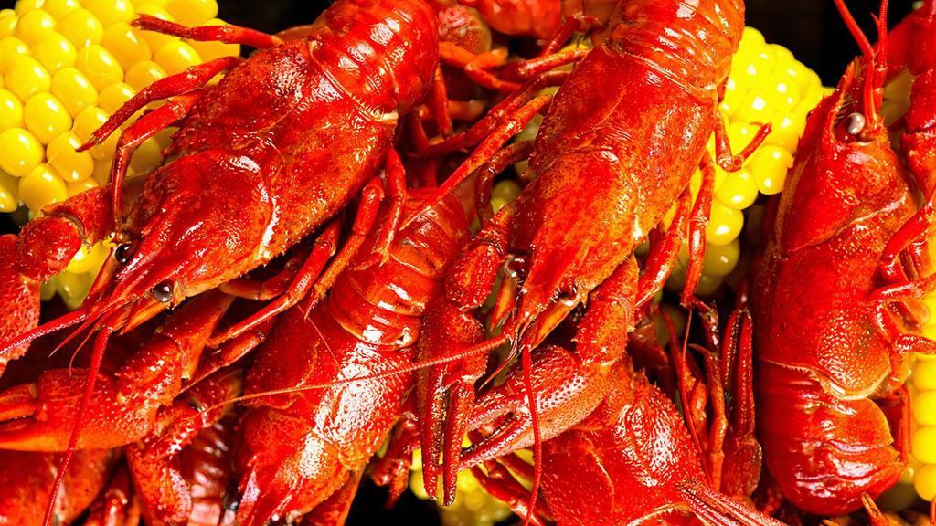 1 Lb. Crawfish · served with potatoes and corn then blended with one of our signature seasoning you choose.