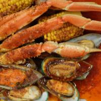 Snow Crab Leg & Mussels(1/2Lb Each Or 1Lb Each) · Served w. potatoes and corn blended with one of our signature seasoning you choose and serve...