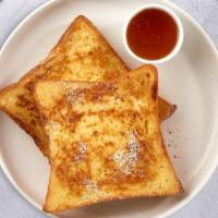 Eggsy French Toast · Home Style Challah French Toast with Two Eggs Any Style