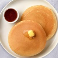 Eggsy Pancakes · Buttermilk Pancakes with Two Eggs Any Style
