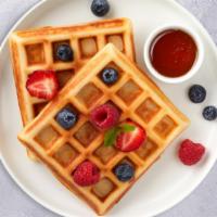 Bling Bling Berry Belgian Waffle · Crisp Belgian Waffle with Strawberries & Whipped Cream