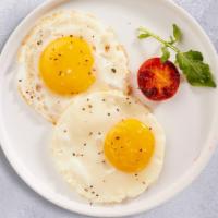 Winter Bacon And Eggs · Two Country Fresh Eggs Any Style with Canadian bacon