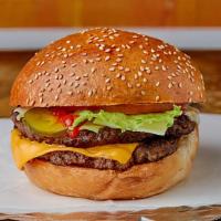Double Cheeseburger · Two- Five ounce 100% halal beef patties grilled to perfection topped with melted American ch...