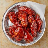 Bbq Wings · Cooked wing of a chicken coated in sauce or seasoning.