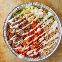 Combo Over Rice · A delicious meal combining our lamb gyro and chicken gyro meat, marinated for 24 hours and g...