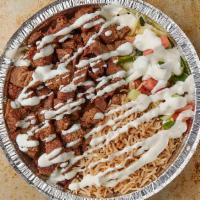 Lamb Over Rice · A delicious meal of lamb gyro served on our fluffy aromatic basmati rice with a salad in the...
