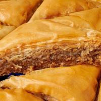 Baklava · Delicious desert pastry filled with almonds and pistachios, covered in honey