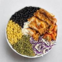Pacifica Crispy Chicken Bowl · RIghtRice + cabbage, crispy chicken, cotija cheese, pumpkin seeds, cherry tomatoes, black be...