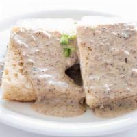 -Biscuits & Gravy- · Four biscuit halves served with a choice of sage sausage gravy, red eye gravy, or tomato gra...