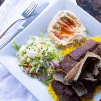 Beef Gyro Plate · Marinated strips of lamb and beef, served with basmati rice, hummus, tzatziki sauce, salad, ...