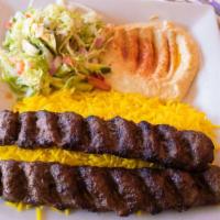 Kufta Kabob Plate · Ground beef mixed with onions, parsley, and seven spices. Served with basmati rice, hummus, ...