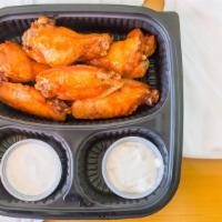 Traditional Wings (6) · Choose from plain, BBQ, buffalo or old bay, served with ranch dressing or blue cheese.