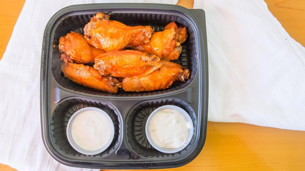 Traditional Wings (6) · Choose from plain, BBQ, buffalo or old bay, served with ranch dressing or blue cheese.