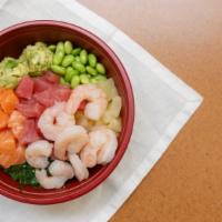 Toro Bowl · Tuna, salmon, shrimp, avocado, pineapple, edamame, seaweed salad, pickled ginger, wasabi may...