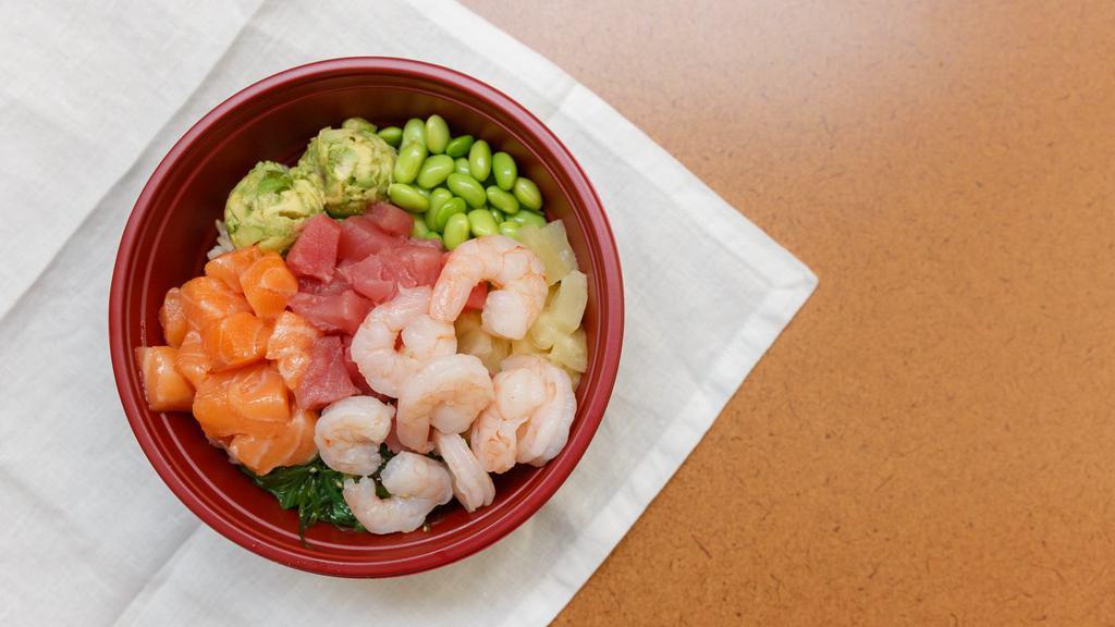 Toro Bowl · Tuna, salmon, shrimp, avocado, pineapple, edamame, seaweed salad, pickled ginger, wasabi mayo, spicy mayo, toro soy.