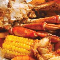 Crablegs · Crablegs with corn, potatoes, and a boiled egg.