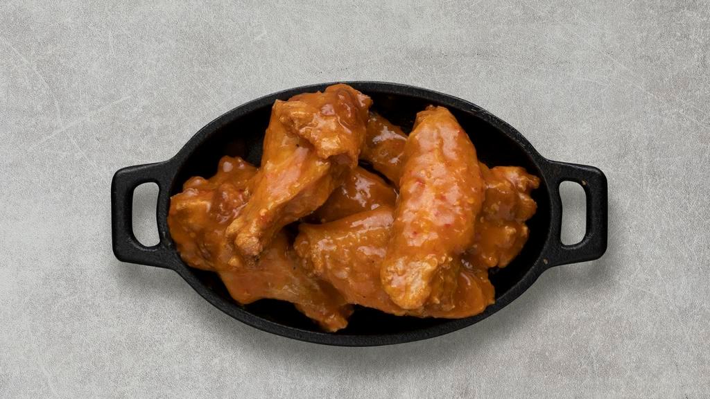 Mango Habanero Wings · Served with celery or carrots, and blue cheese or ranch.