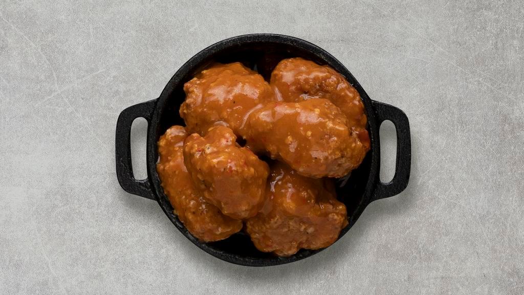 Mango Habanero Boneless Wings · Served with celery or carrots, and blue cheese or ranch.