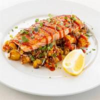 Hawaiian Seared Salmon Gf | Df · pan-seared sustainably sourced salmon topped with house-made BBQ sauce; served over pineappl...