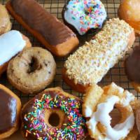 Assorted Dozen · We'll put together a variety of our most popular yeast-raised and cake donuts and up to 4 fi...