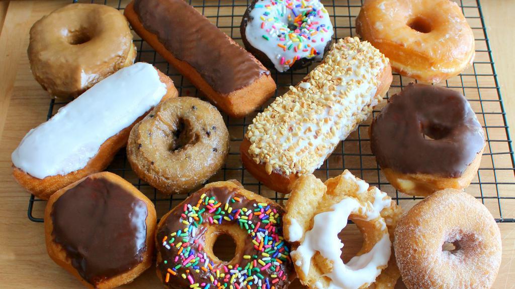 Assorted Dozen · We'll put together a variety of our most popular yeast-raised and cake donuts and up to 4 filled long johns or bismarks. *Please note: requests for specific donuts in your dozens cannot be accommodated through Door Dash ordering.