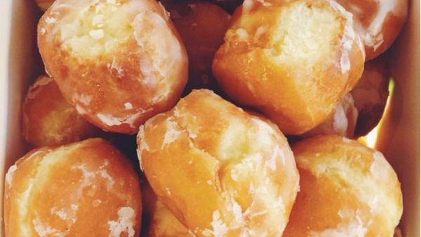 Glazed Donut Holes · Yeast-raised glazed donut holes are the perfect bite size treats!