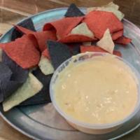 Chips & Queso · Our local sweet made pimento queso & tortilla chips.