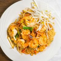 Pad Thai · Thin rice noodles stir-fried with bean sprouts, crushed peanuts, scallions and egg.
