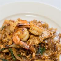 Drunken Noodle · Hot. Wild rice noodles topped with egg, chicken and shrimp, basil cooked in a chili garlic s...