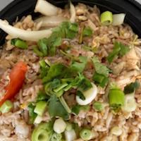 Fried Rice · Jasmine rice stir-fried with onions, scallions, tomatoes and egg.