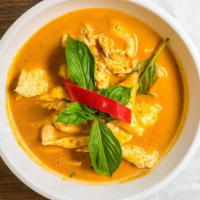 Panang Curry · Medium. Choices of your meat cooked in a curry peanut sauce and basil.