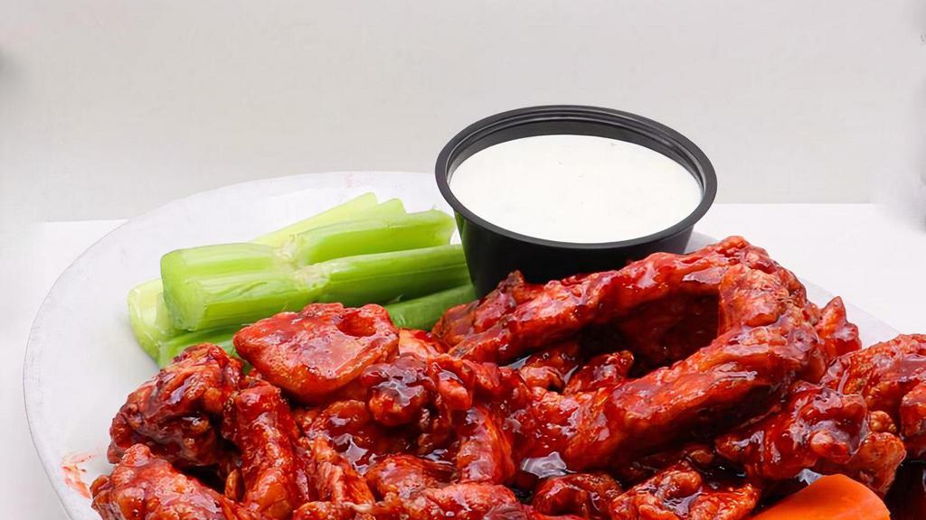 Boneless Wings · Served with celery, carrots and choice of sauce.