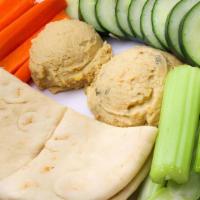 Hummus Platter · Choice of jalapeno or regular hummus served with an assortment of vegetables and pita bread.