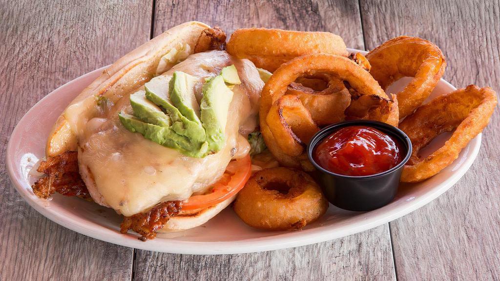 Avocado Sandwich · A grilled chicken breast topped with Monterey Jack cheese, 2 strips of bacon and sliced avocado with lettuce, tomato and mayonnaise. Served with choice of side.