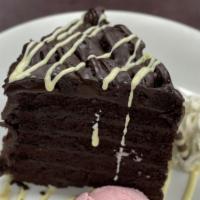 Prime Cut Chocolate Cake · black cherry gelato, whipped cream, vanilla anglaise