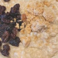 Bowl Of Hot Oatmeal · Served with brown sugar and raisins