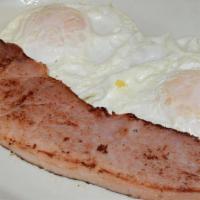 Two Eggs Any Style With Meat · Choice of bacon, sausage, turkey sausage, scrapple, or canadian bacon