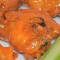 Buffalo Wings · Served with bleu cheese dressing and celery sticks
