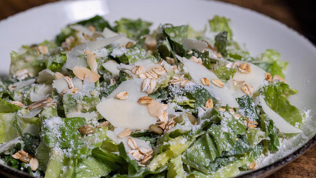 Caesar Salad · Hearts of Romaine, Rye Croutons, Garlic Chips,  Parmesan Cheese, Classic Caesar Dressing