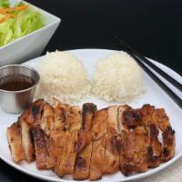 Chicken Teriyaki · Grilled marinated chicken thigh and rice. Served with side lettuce salad (poppy seed dressin...
