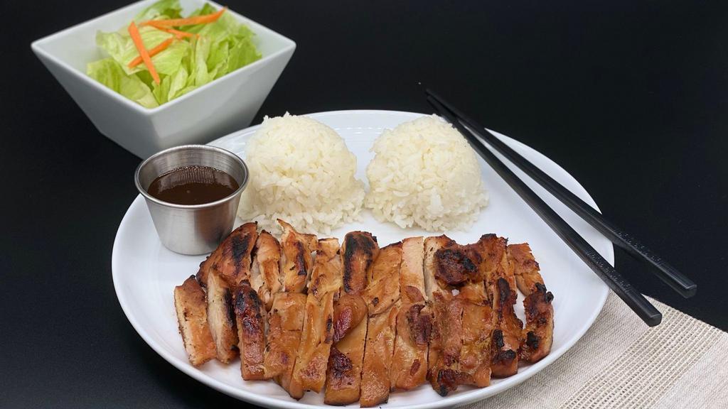 Chicken Teriyaki · Grilled marinated chicken thigh and rice. Served with side lettuce salad (poppy seed dressing).