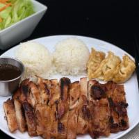 Chicken & Potstickers · Grilled marinated chicken thigh, rice, and three pieces chicken potstickers. Served with sid...