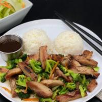 Broccoli Chicken Teriyaki · Stir-fried chicken and broccoli. Served with rice. Served with side lettuce salad (poppy see...