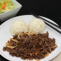 Beef Teriyaki · Marinated beef and rice. Served with side lettuce salad (poppy seed dressing).