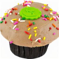 Old Fashioned Birthday Cake · Soft yellow cupcake with buttery sweet milk chocolate frosting with rainbow sprinkles.